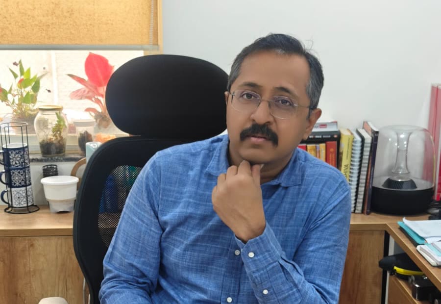Dr. Sachin Patil at his desk